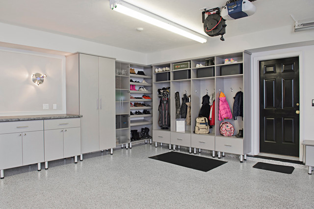 Garage organization with wall-mounted tool storage and overhead ceiling racks
